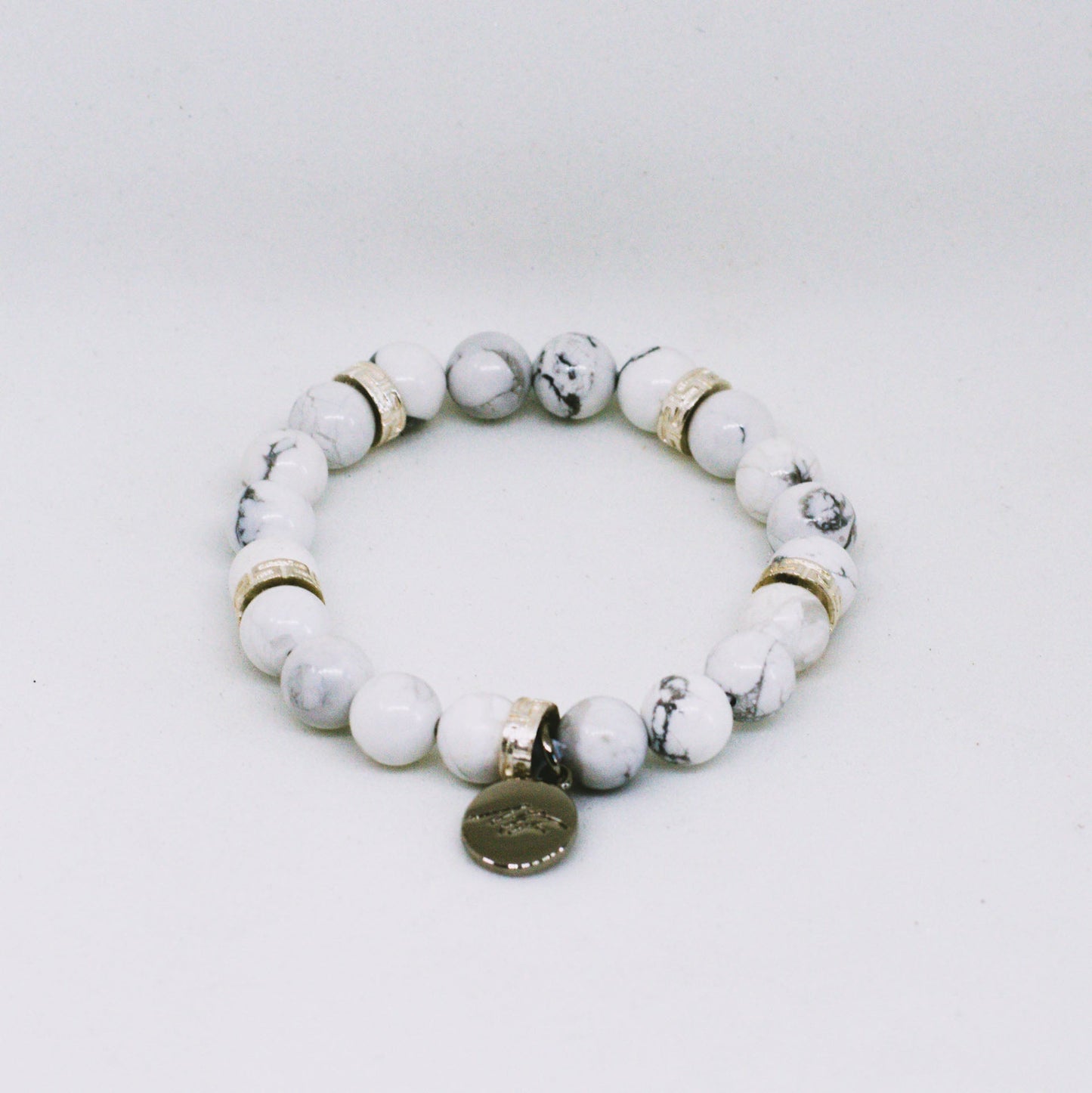 White Howlite Roman Flat Silver Bead Bracelet (8 MM)