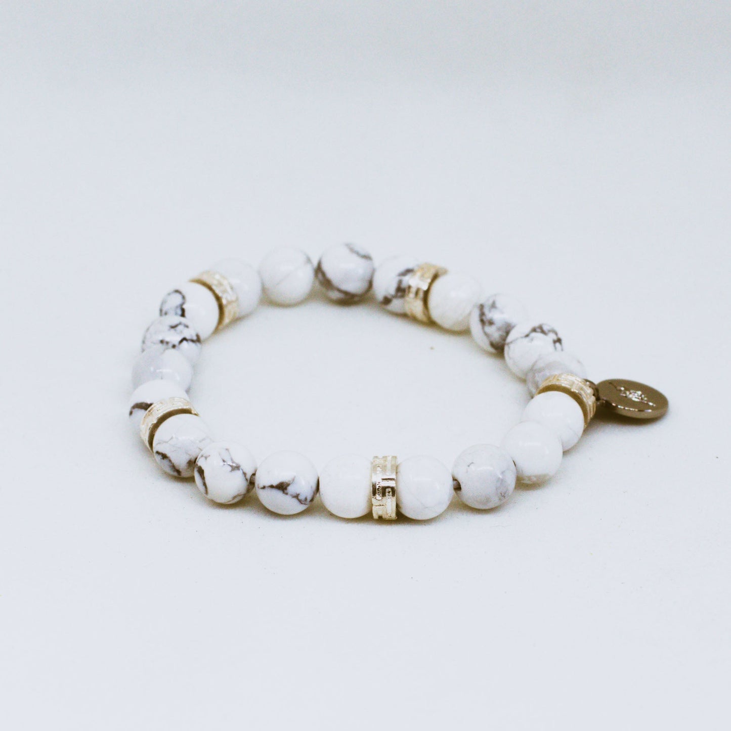 White Howlite Roman Flat Silver Bead Bracelet (8 MM)